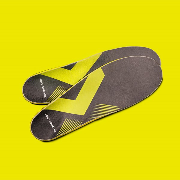 Two Sport-style custom insoles showing comfortable top padding and the Sole Dynamix logo.