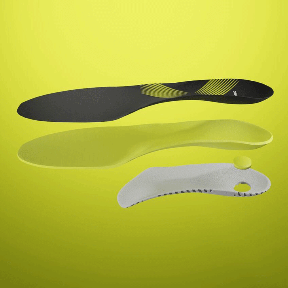 An exploded Sport shoe insole, showing the top cover, padding, custom bottom shell, and heel pad.